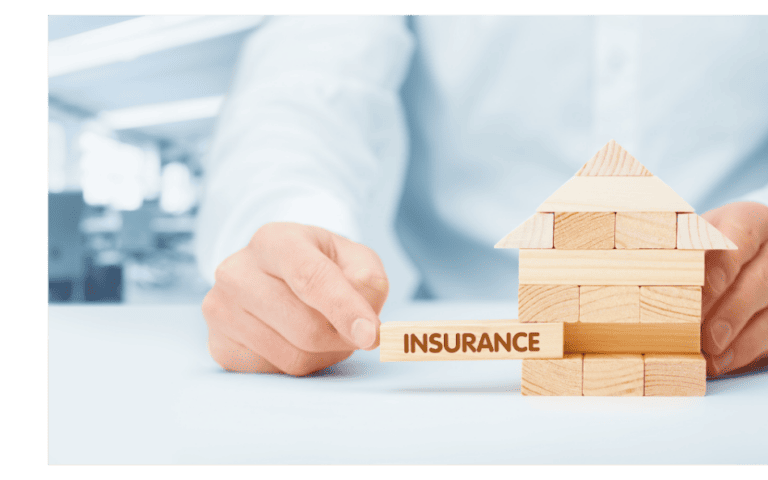 Block labeled 'INSURANCE' being pulled from a wooden house, symbolizing business risk and Chamber support.